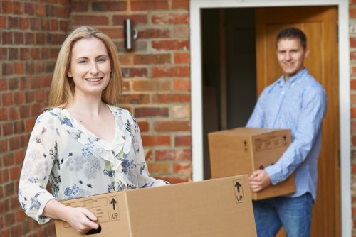 Furniture and boxes being transported by a man and van service