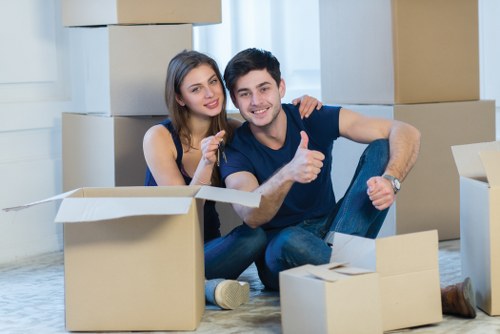 Unpacking boxes in a Kew property after moving day