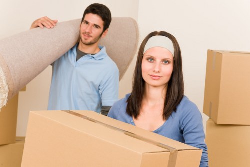 Packed office equipment and furniture ready for relocation