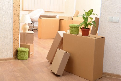 Organised office boxes and desks prepared for relocation