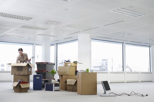 Office furniture and equipment packed for commercial move in Kew