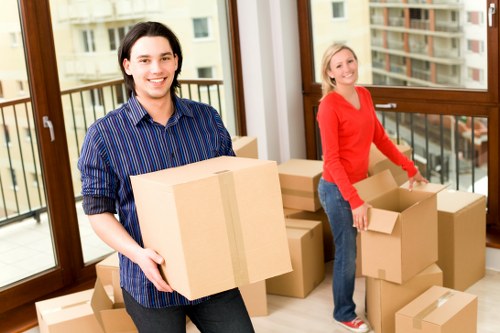 Packed boxes and furniture ready for transport in Kew