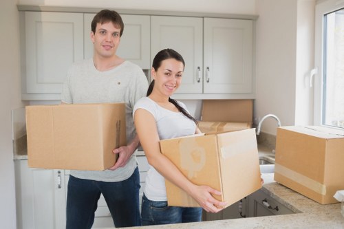 Packed boxes and wrapped furniture ready for a Kew house move